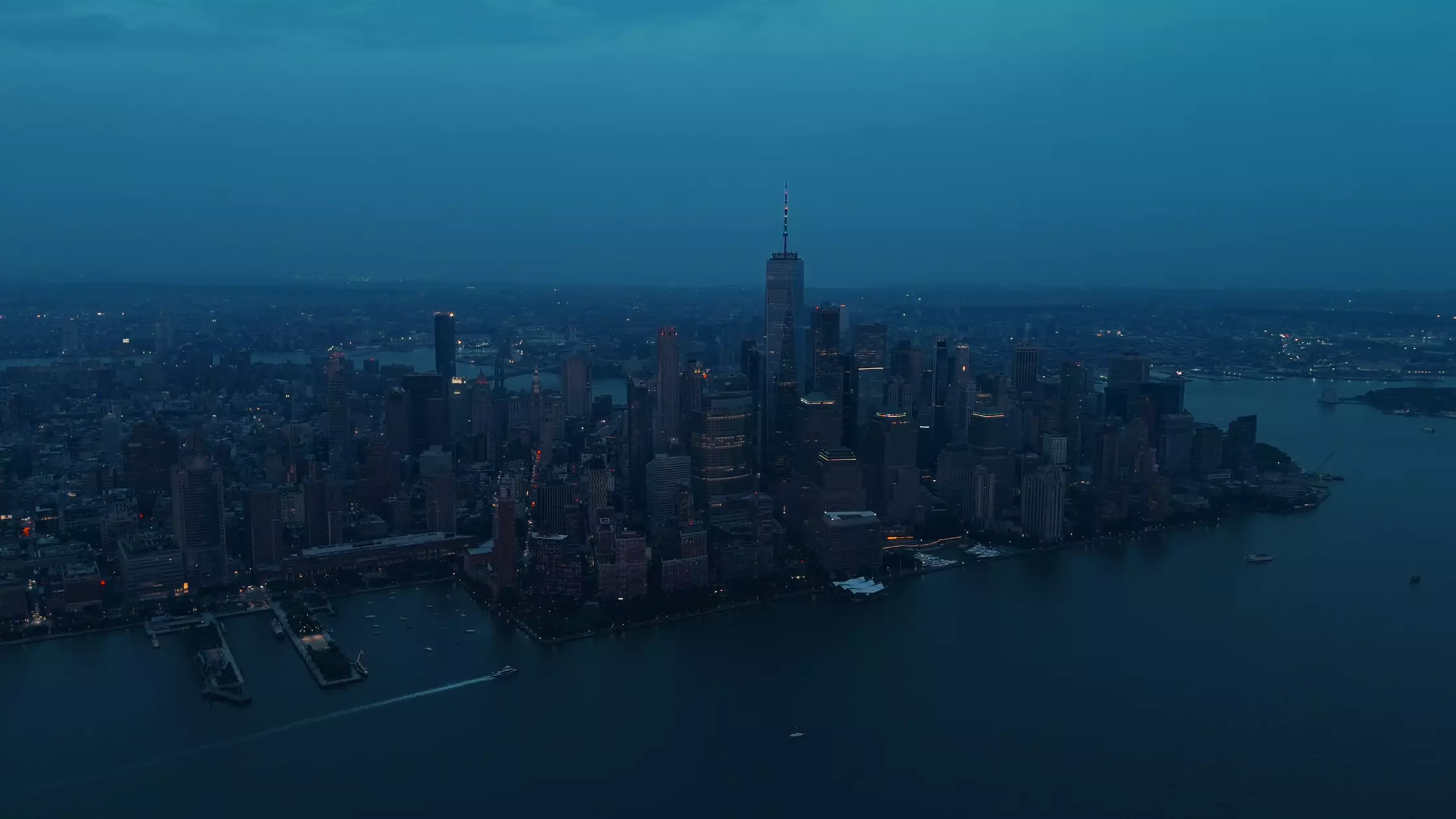 An aerial view of a city skyline at dusk